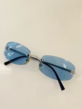 RARE 💫 vintage Chanel blue rimless sunglasses.